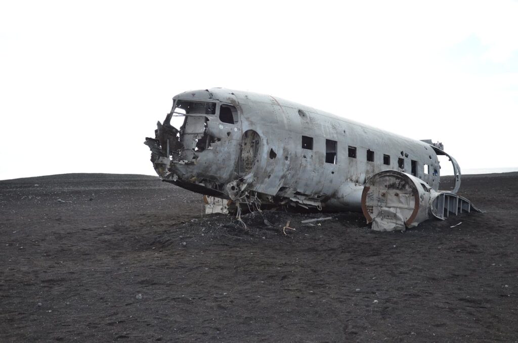 Gray Airplane on Seashore